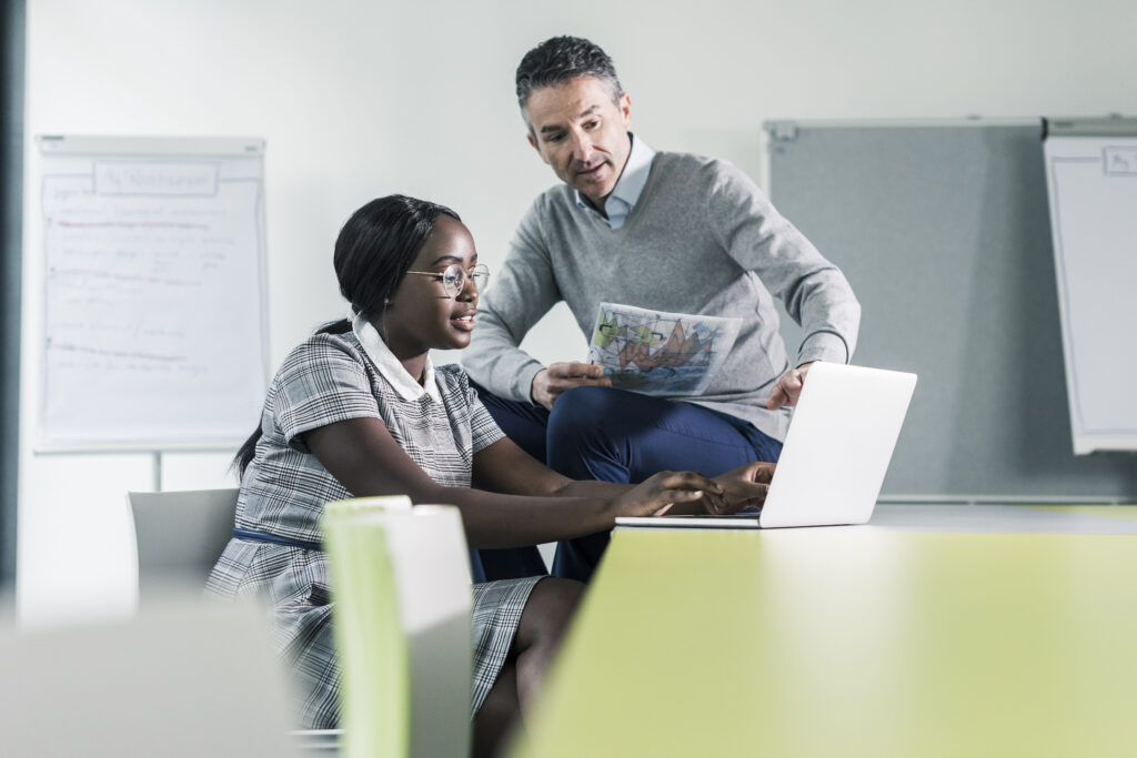 teacher and student working